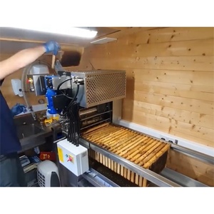 Macchina automatica per non tappare il telaio a pettine per miele