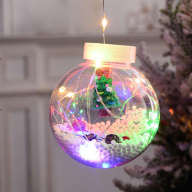 Boule transparente avec sapin de Noël