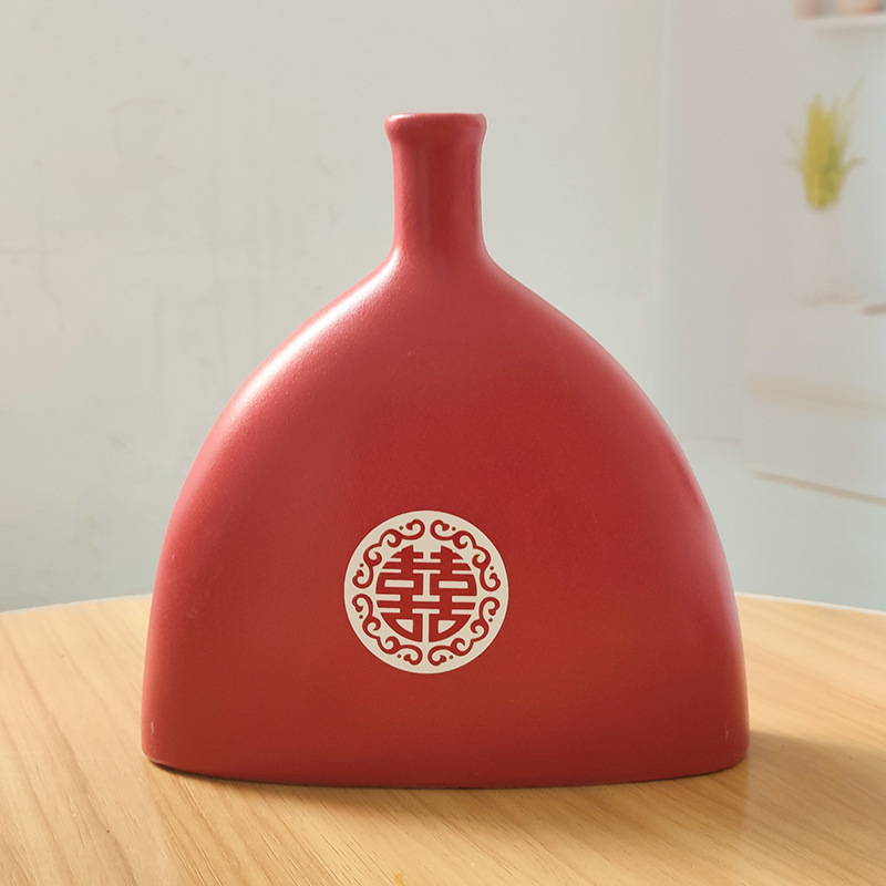 Bouteille de mariage rouge givré