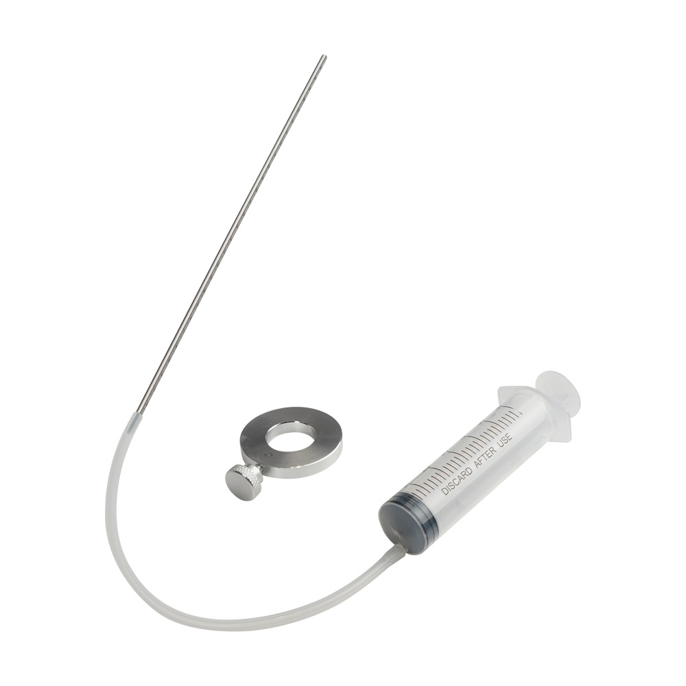Inyector de aceite para horquilla