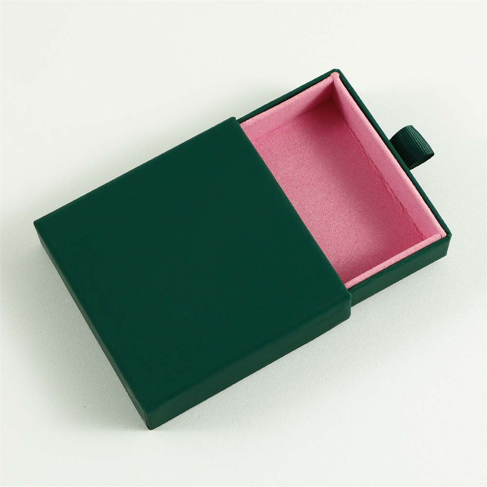 Dark green box with peach pink lining