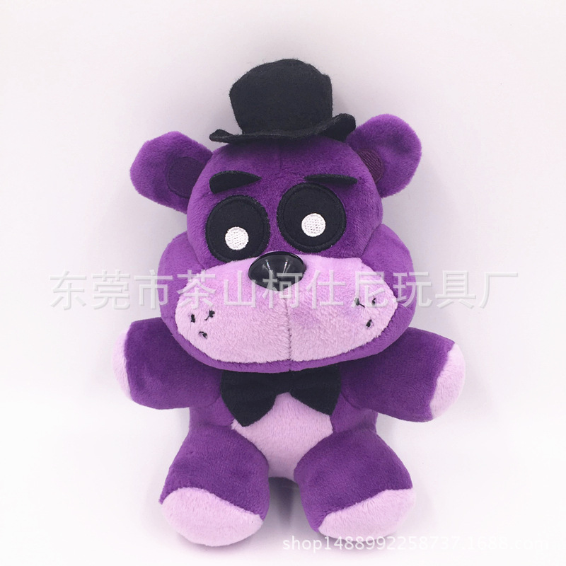 Oso morado de 18 cm.