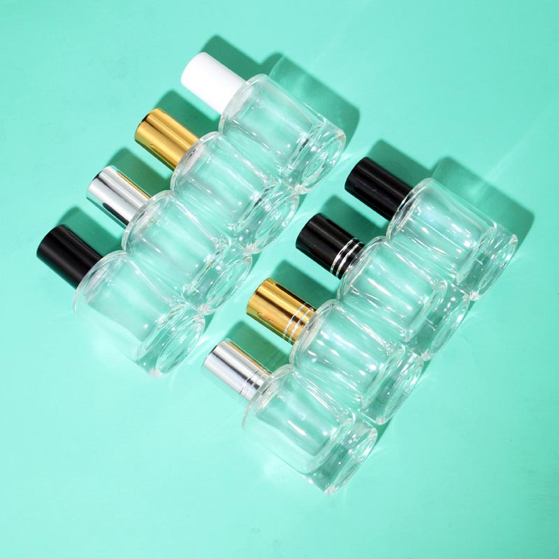 Botella cilíndrica transparente de 10 ml con cuerpo corto y robusto
