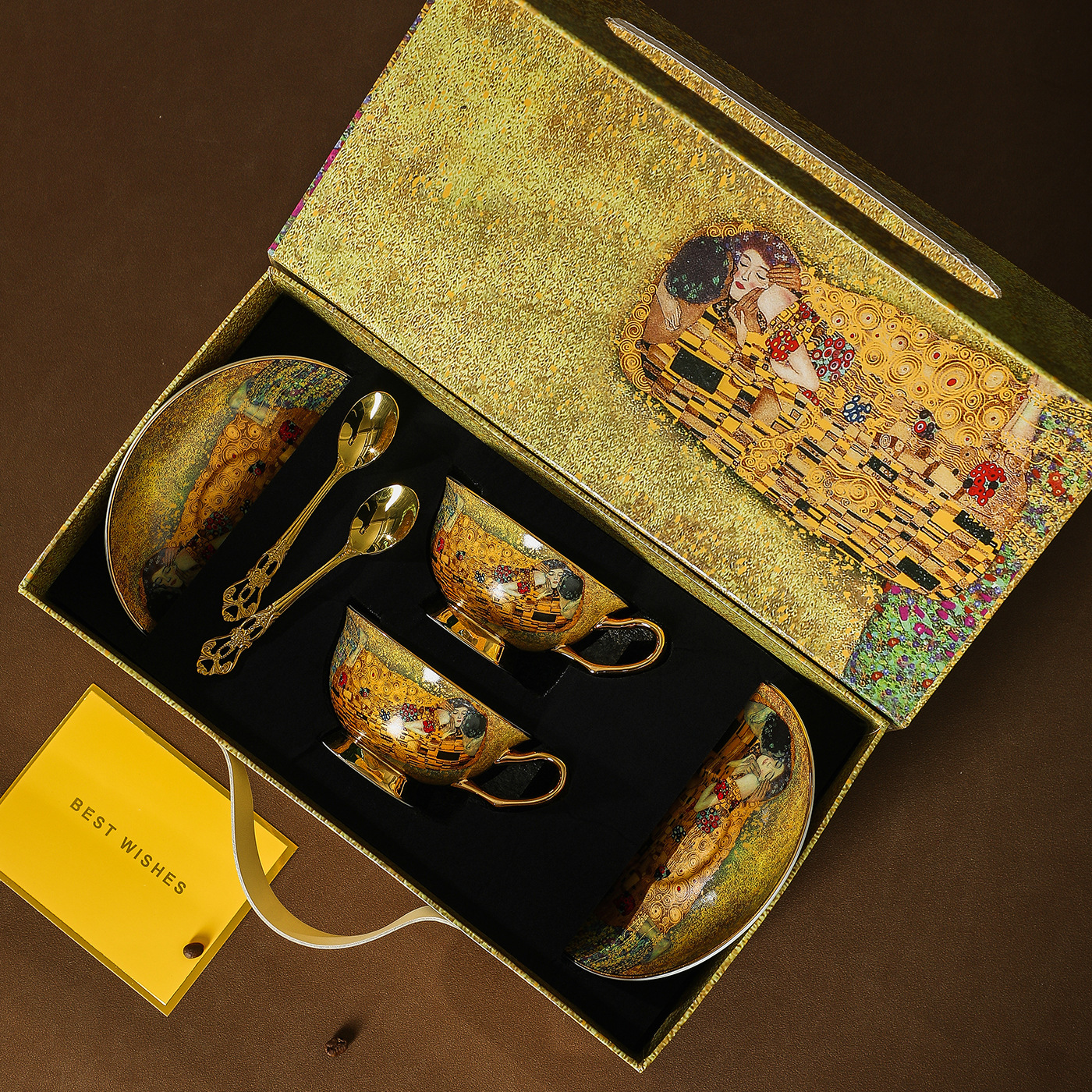 Ensemble cadeau : tasse et soucoupe, cuillère, couple égyptien.