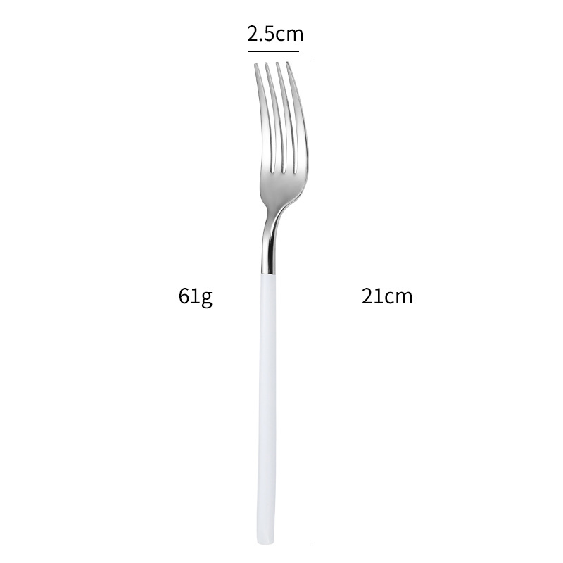 Fourchette de table argentée et blanche