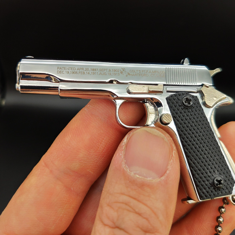 ของขวัญพวงกุญแจโมเดลปืนทำจากโลหะทั้งหมด1911สีเงินสว่าง1:3อยู่รอด - Product Image 3