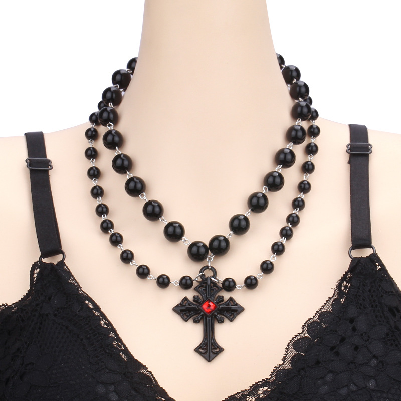 Red diamond cross pendant necklace