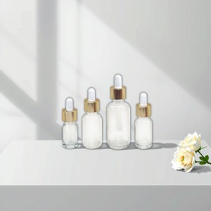 Para Venda Clear Flat 5ml <span class=keywords><strong>10ml</strong></span> 15ml 20ml 30ml 50ml 100ml Vazio Redondo Cilindro Garrafa Conta-gotas De Vidro Garrafa De Óleo Essencial