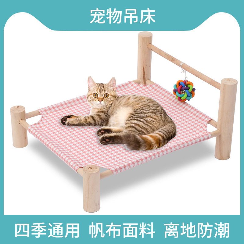 White and blue cat-themed wooden pet bed