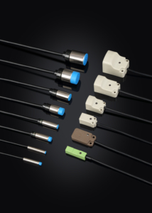 Rilevamento di piccoli oggetti sensore di rilevamento laser di uscita dell'interruttore di distanza a infrarossi per l'industria dell'imballaggio riflec speculare