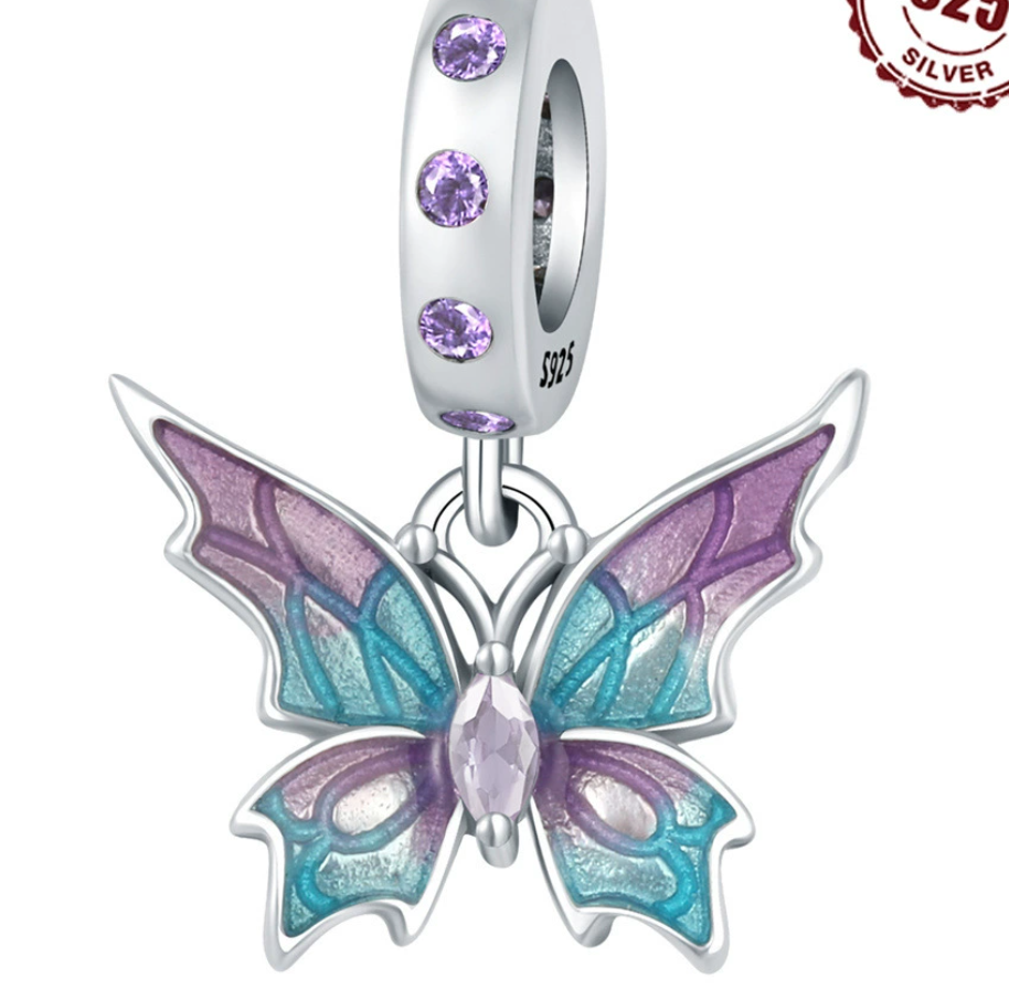 Pendentif papillon époxy transparent bleu violet 0117