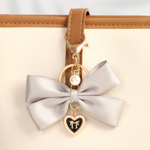 <strong>Luxury</strong> Pearl Keychain Fashion Bowknot <strong>Key</strong> Ring Cute Handbag Bag Charm Pendant Handmade Heart Bow Keychain Cheerleading <strong>Key</strong> Chain - Product Image 4