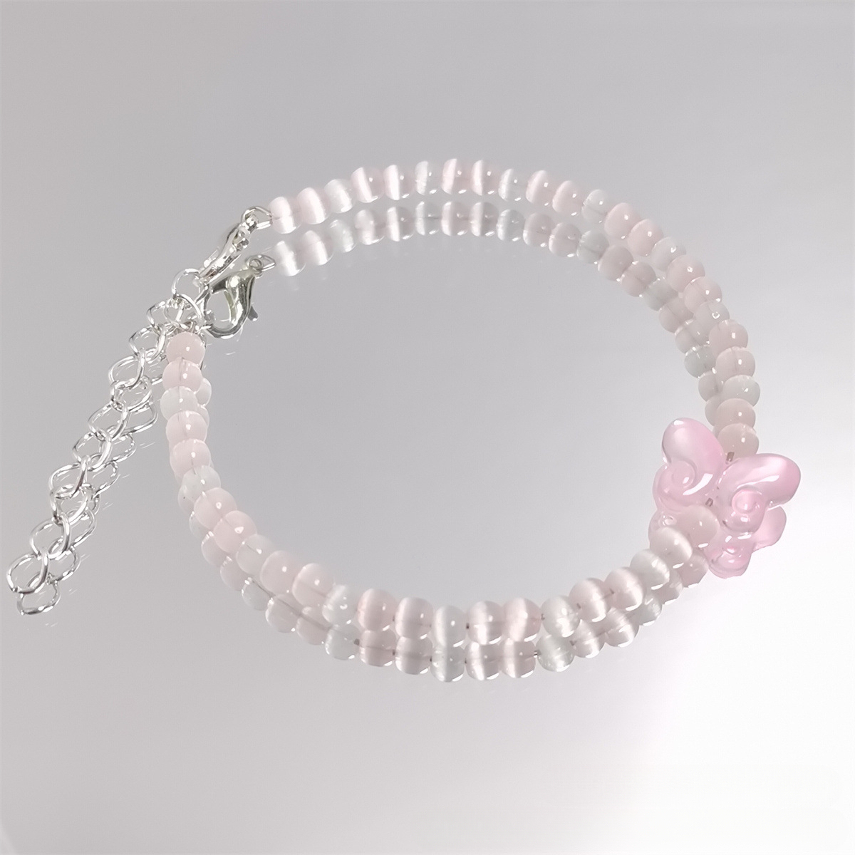 Perles de riz en œil-de-chat colorées, poudre claire