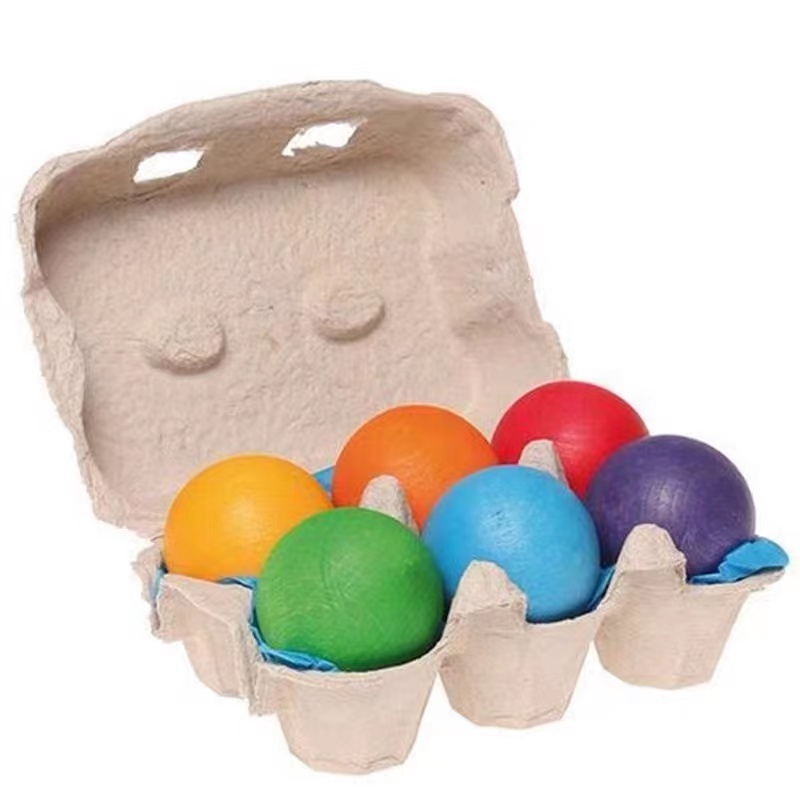 Boules de 4,5 cm dans une boîte à œufs.