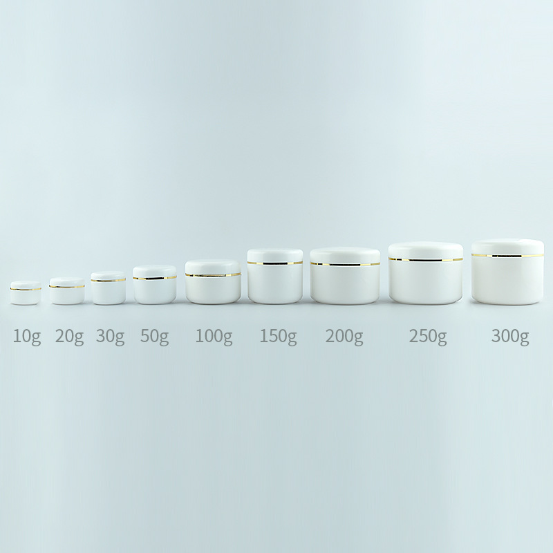 white jar with gold rim lid