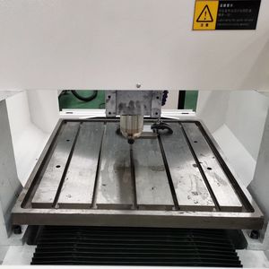Enrutador CNC con fresadora automática Enrutador CNC 6090 Metal 3 Axis 4 Axis Máquina enrutadora CNC con mesa giratoria - Product Image 5