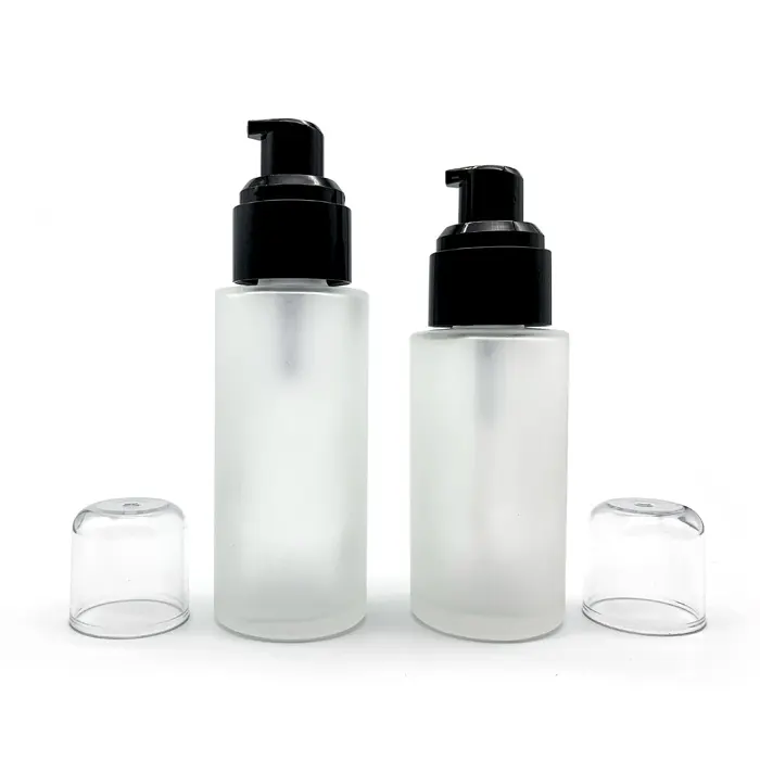 Low price clear glass bottle with pump lids 30ml 50ml empty lotion bottles