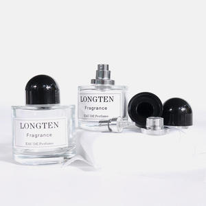 Toptan özel Logo lüks Parfum ambalaj yuvarlak şekil boş temizle 30ml 50ml sprey cam parfüm şişeleri püskürtücü <span class=keywords><strong>ump</strong></span> Cap ile