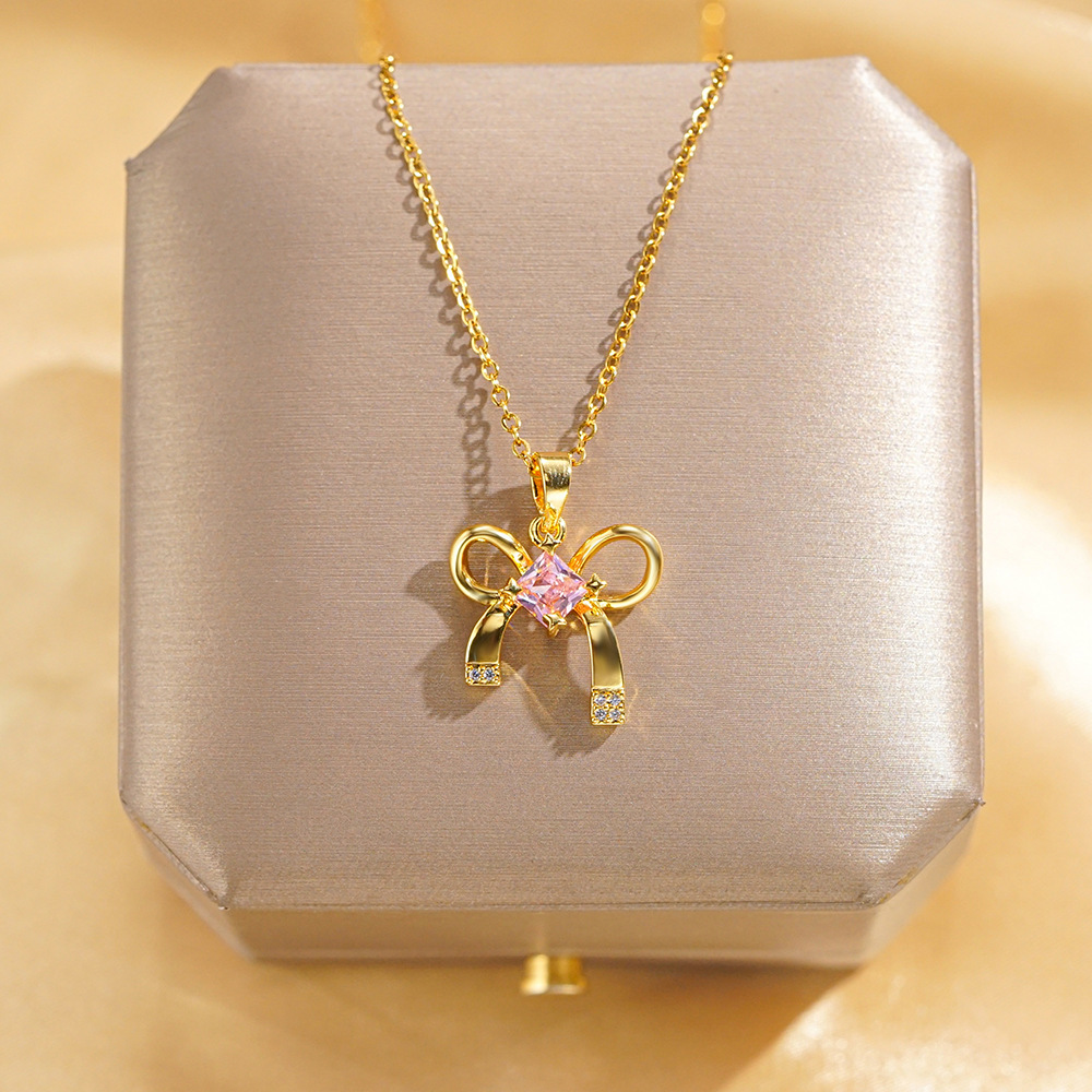 Pink diamond bow necklace