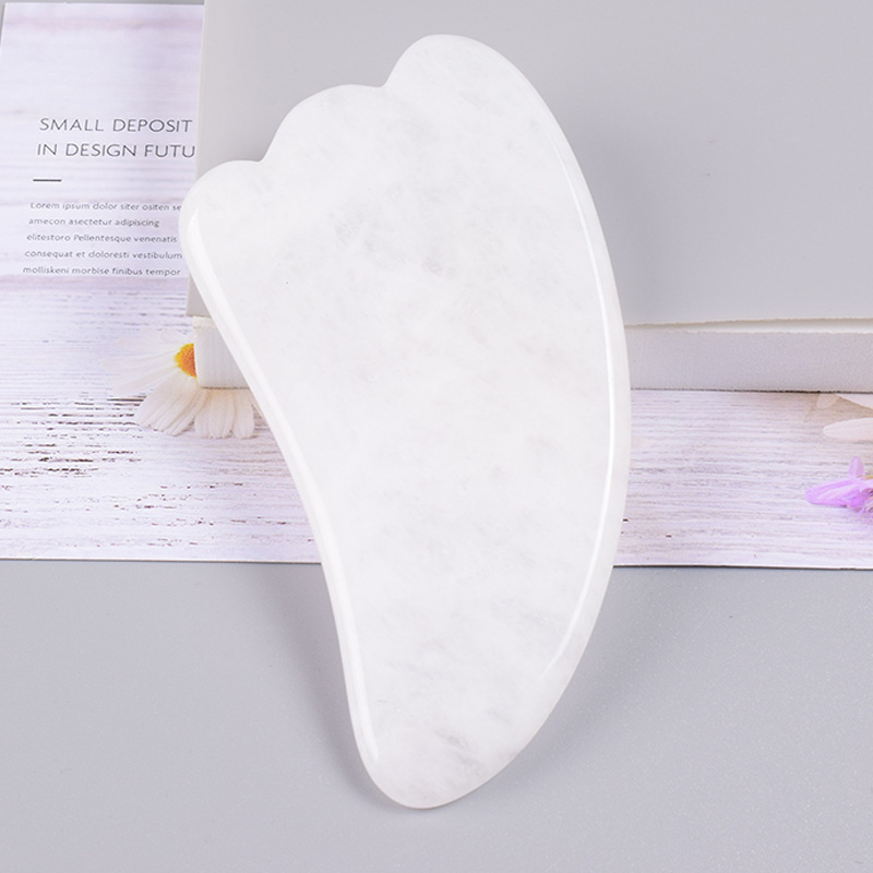 White jade horn-shaped scraping plate