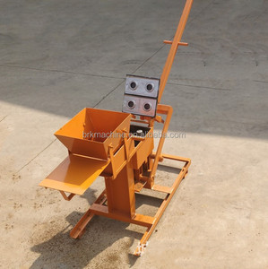 Máquina de fabricación de bloques de arcilla de la india, mini máquina manual de QTS2-40 para hacer ladrillos - Product Image 4