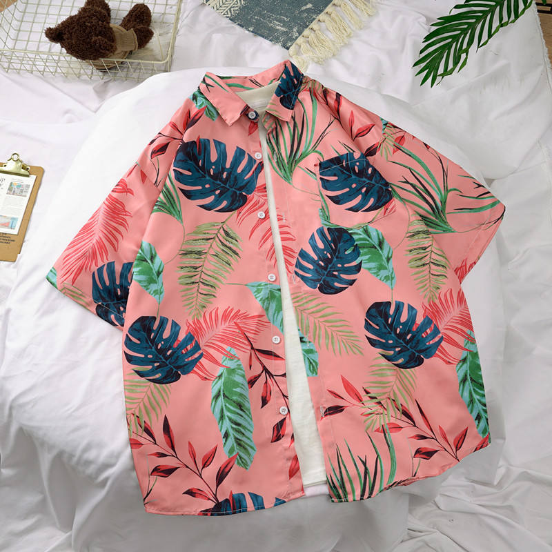 เสื้อเขตร้อนสีชมพูและสีเขียว