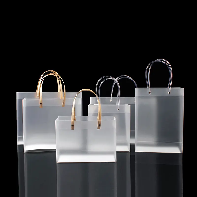 Venta al por mayor de bolsas de plástico transparente de PVC con logotipo personalizado PP PLA HDPE embalaje de regalo bolsa de compras de vinilo transparente de PVC