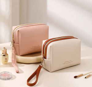 <strong>2025</strong> New Arrival Customized Logo Cream Luxury PU Leather Makeup Bag Large Fashion Portable Zipper Beauty Cosmetic <strong>Pouches</strong> - Product Image 5