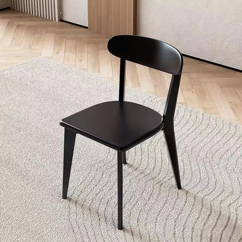 Two chairs in classic black.