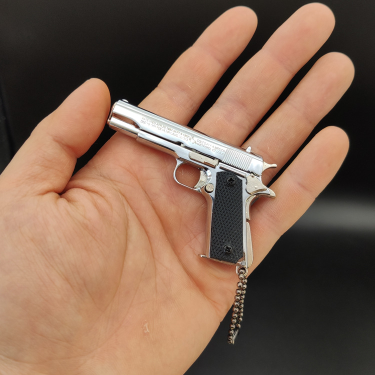 ของขวัญพวงกุญแจโมเดลปืนทำจากโลหะทั้งหมด1911สีเงินสว่าง1:3อยู่รอด - Product Image 4