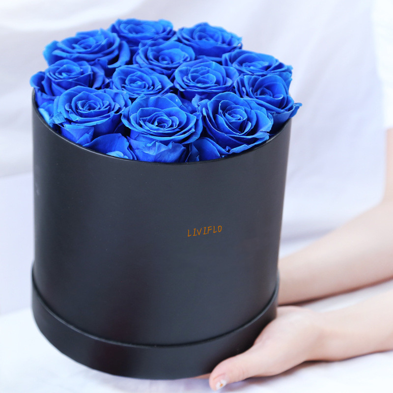 12 Rosas en caja redonda