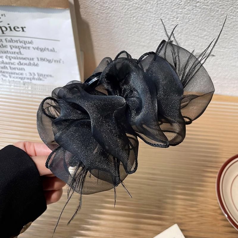 13 black bubble yarn feather claw clip