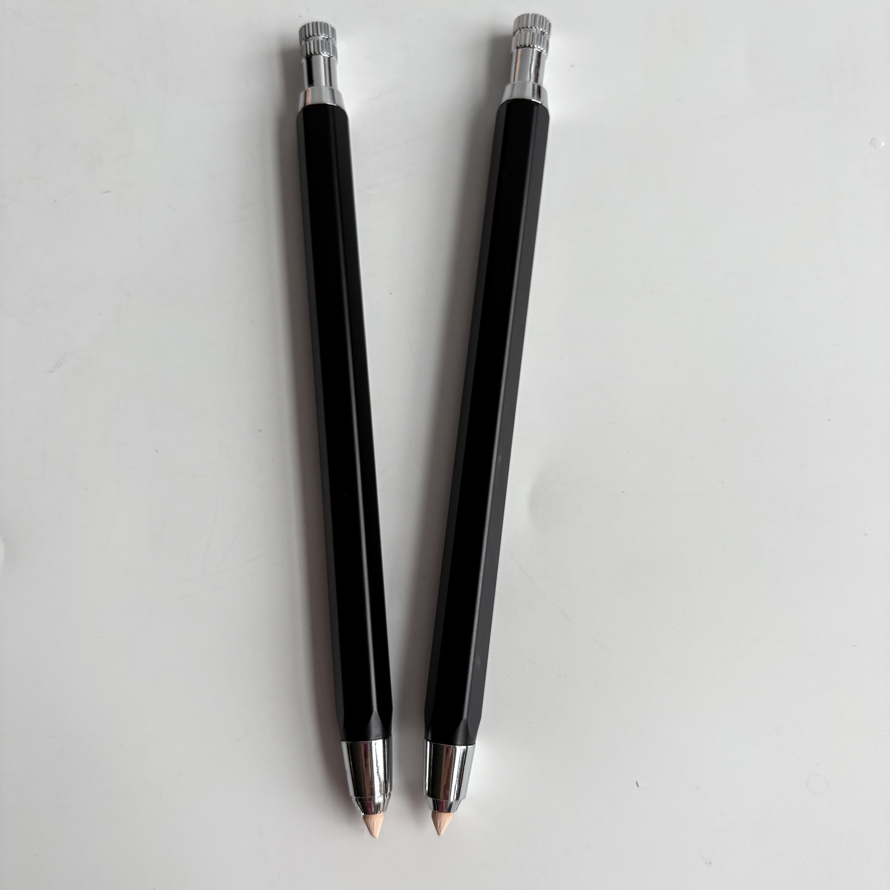 Black pen with nude chalk