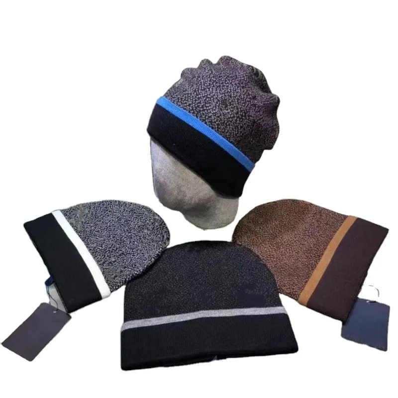 Gorro de diseñador de punto de invierno cálido a la moda para hombres y mujeres