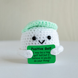 Green hat golf ball