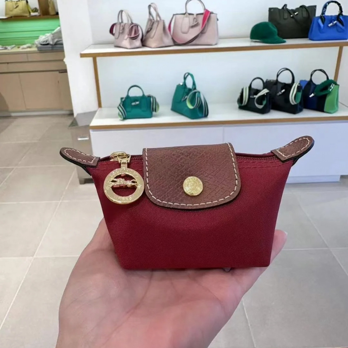 Portefeuille zéro rouge bordeaux avec bandoulière