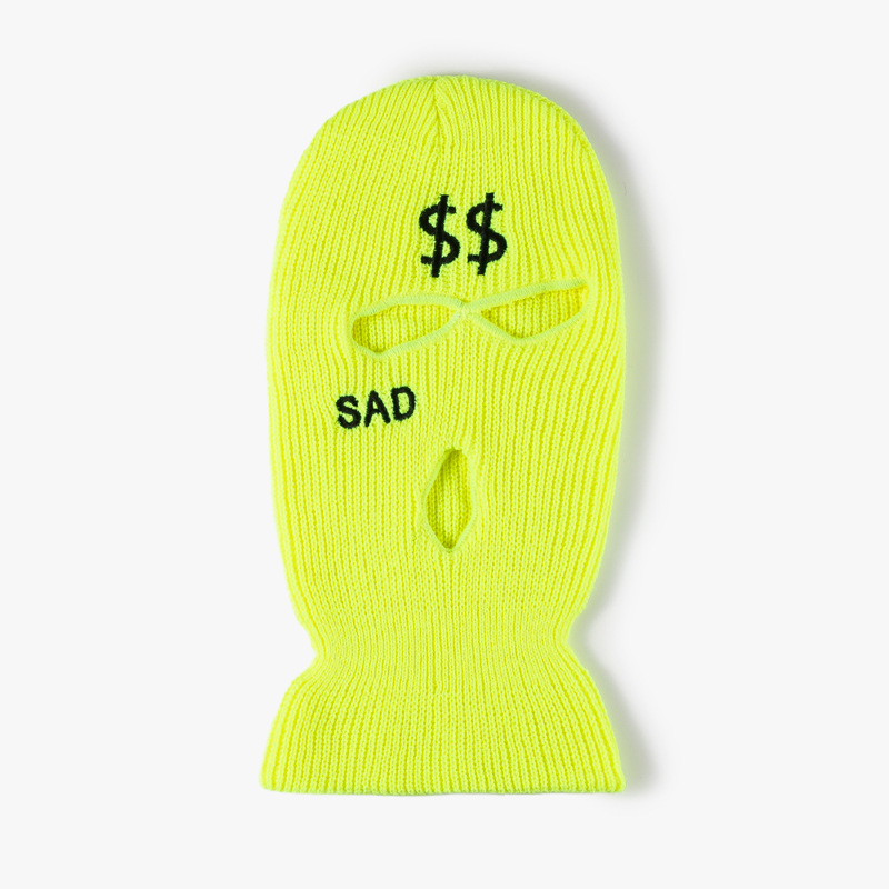Bordado de dólar americano en amarillo fluorescente.