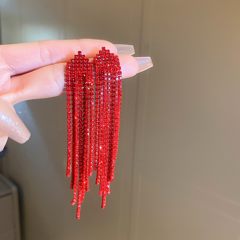 Silver needle-red arrow tassel earrings