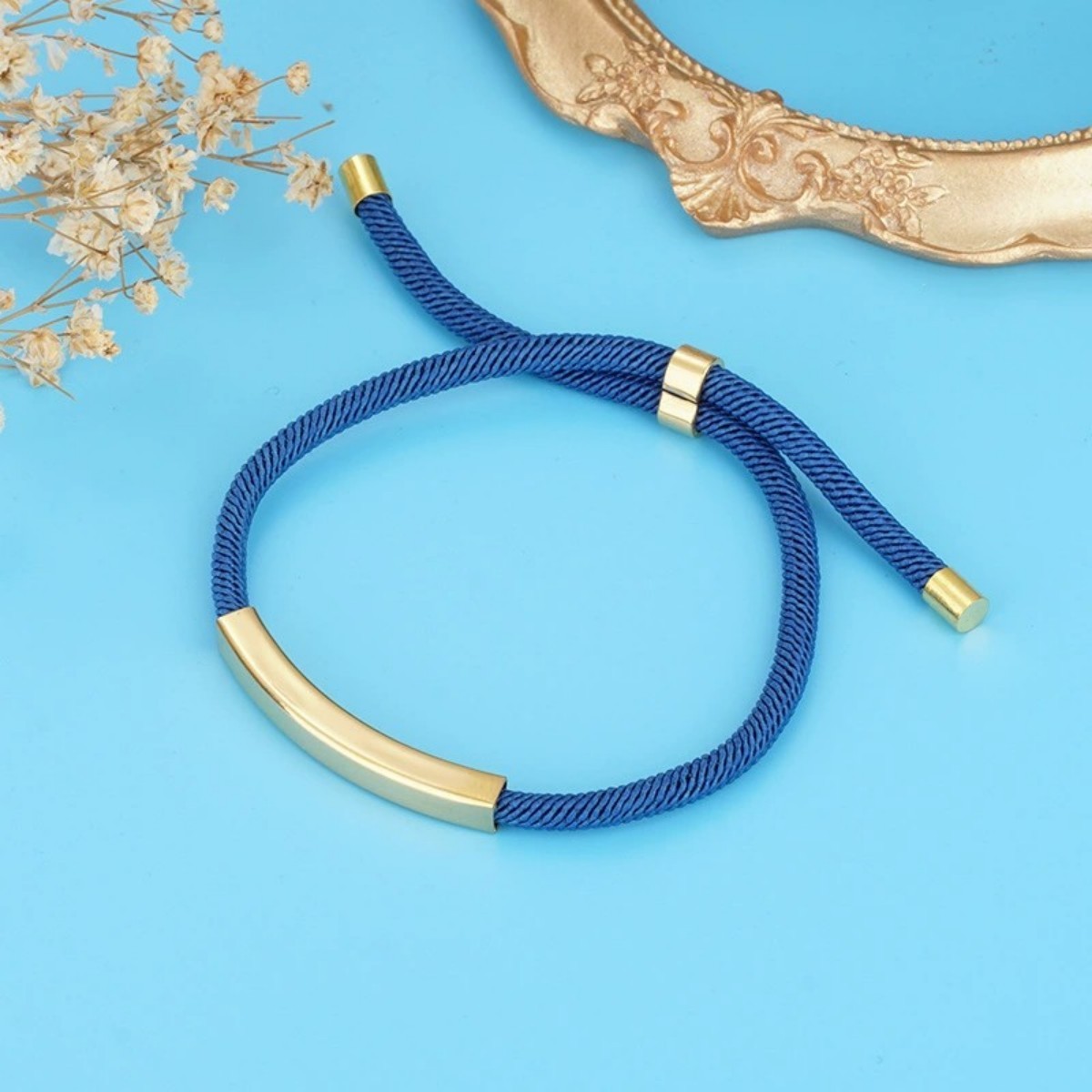 Ciondolo in oro + cordoncino blu