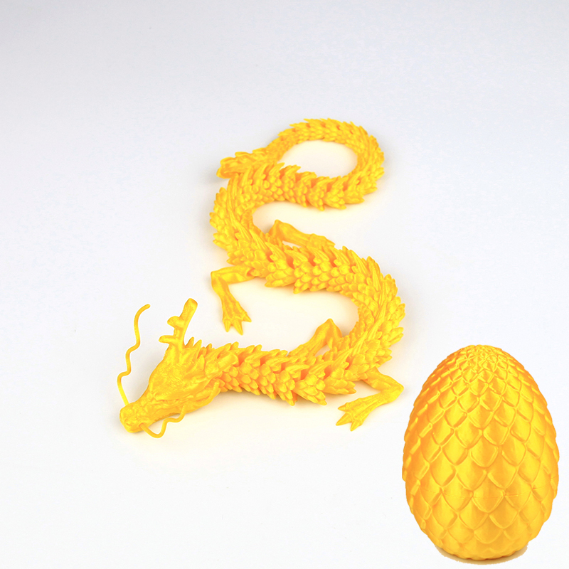 Oeuf doré de 9 cm et dragon chinois doré de 30 cm