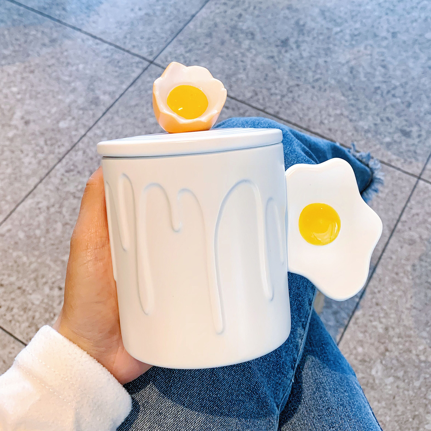 White poached egg-cup lid spoon