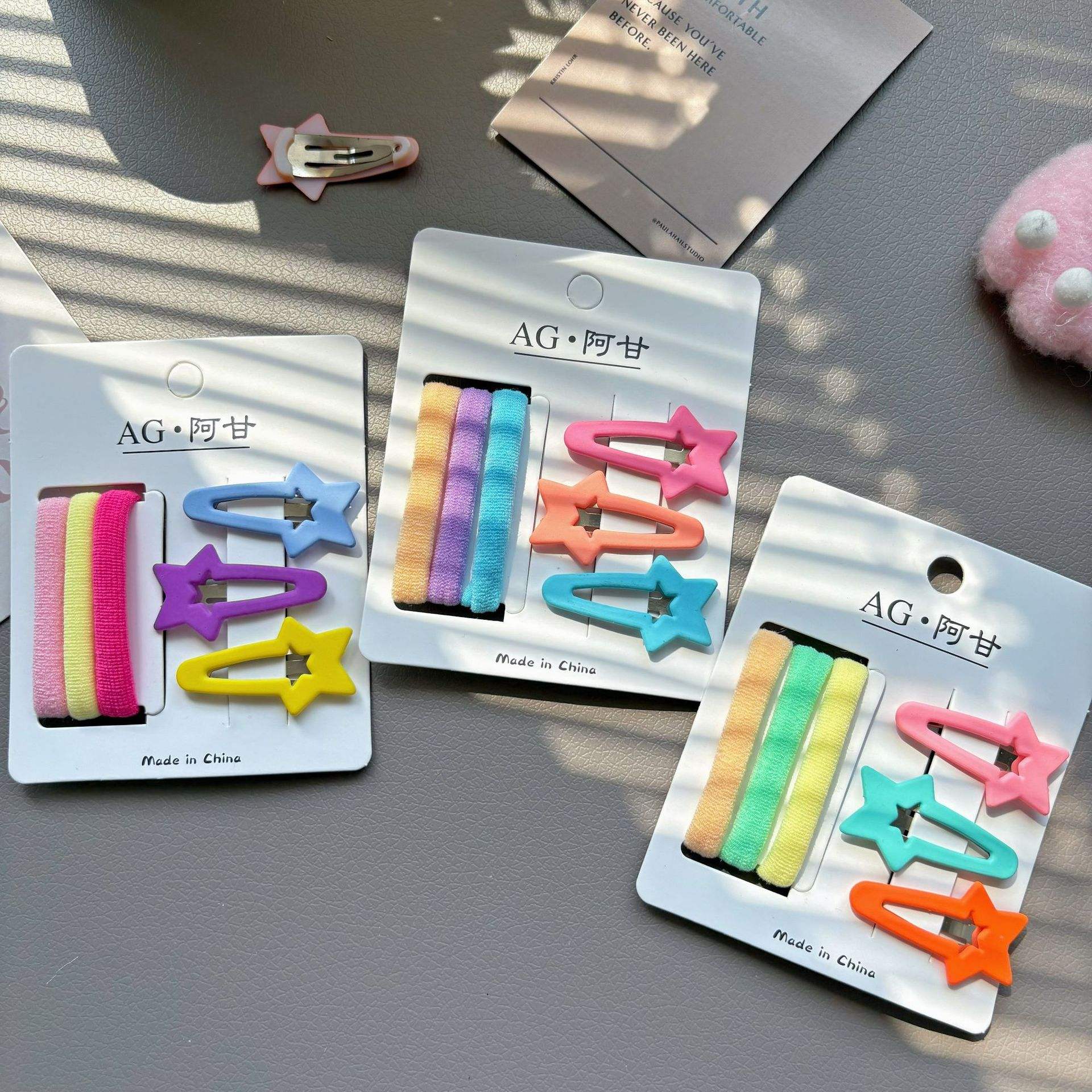 หางดาว3ซม. + แถบยางยืดแบบสุ่มสี