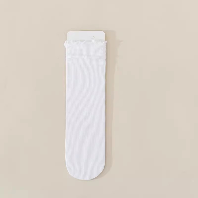 Thin, white stockings with ruffled trim.
