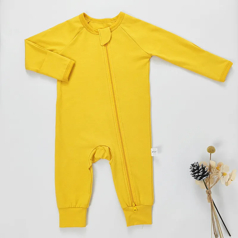 Stock Supply Baby Jumpsuit Pijamas para niños pequeños Sleeper ropa de bebé recién nacido onesie manga larga liso algodón mameluco para bebé