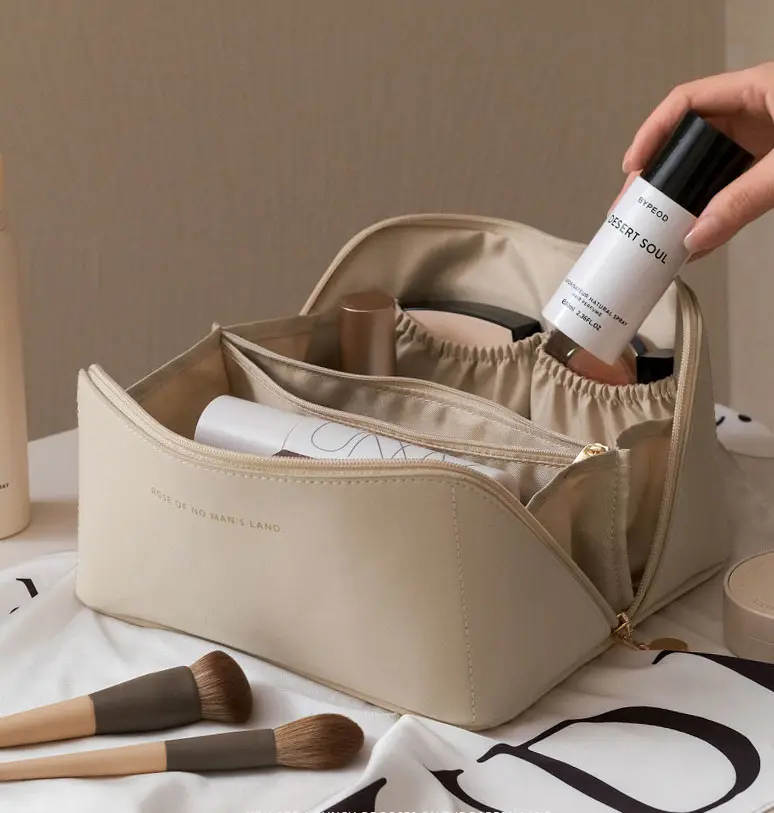 Sac de maquillage cosmétique en cuir PU personnalisé pochette soins de la peau cosmétique cloison stockage étanche voyage trousse de toilette sacs de maquillage