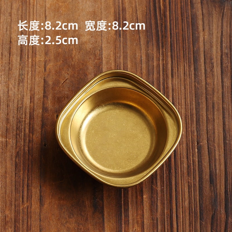 A single-compartment condiment dish with a round shape (retro gold).