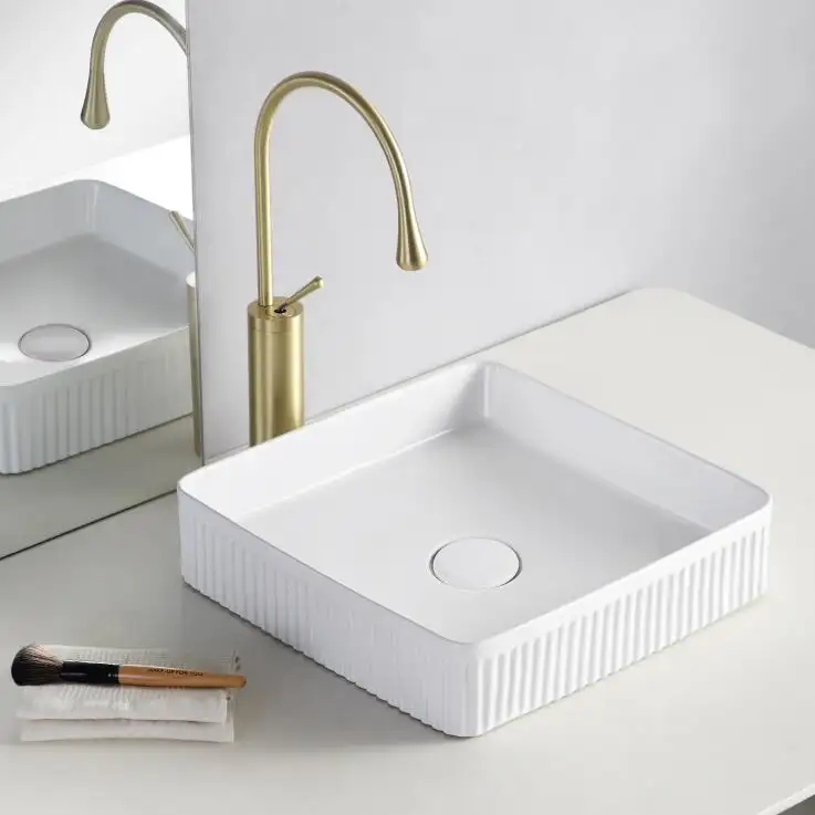 Elegante blanco sanitario lavabos de mesa de cerámica lavabo de mano lavabo de cerámica de lujo para sanitarios