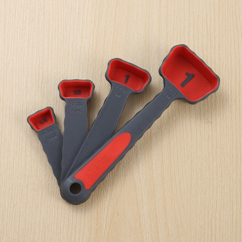 Cuillère doseuse pliante rouge