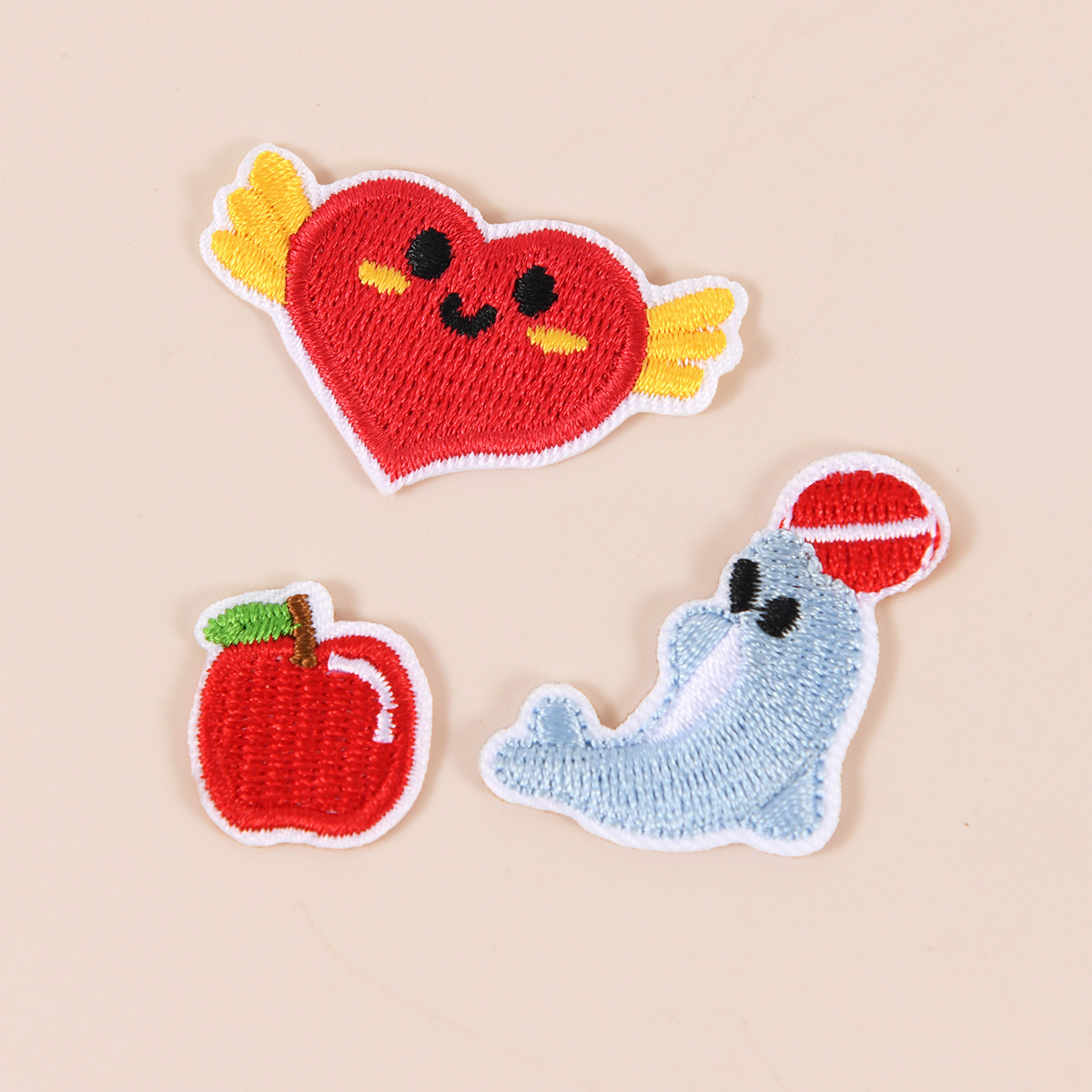 Corazón Volador Rojo Pequeño, Delfín Manzana Roja