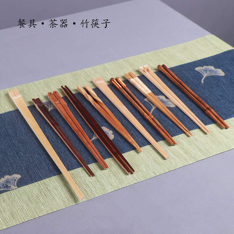 A pair of long smoked bamboo chopsticks